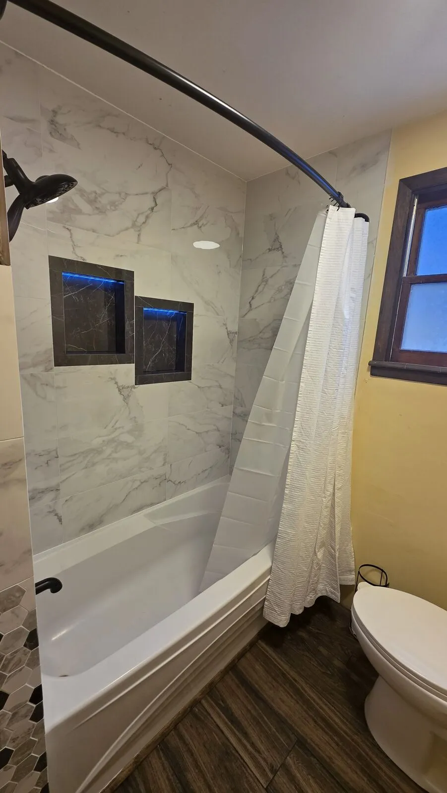 Bathroom remodel: tub surround, niches and hex accent — finished