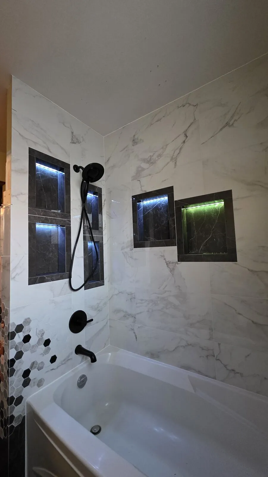 Bathroom remodel: tub surround, niches and hex accent
